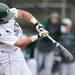 Eastern Michigan sophomore Alex Lakatos hits a single against Michigan at Eastern on Wednesday.  Melanie Maxwell I AnnArbor.com